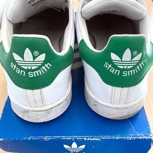 Big Kid’s Adidas Stan Smith shoes.